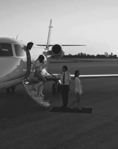 Traveller boarding a private aircraft
